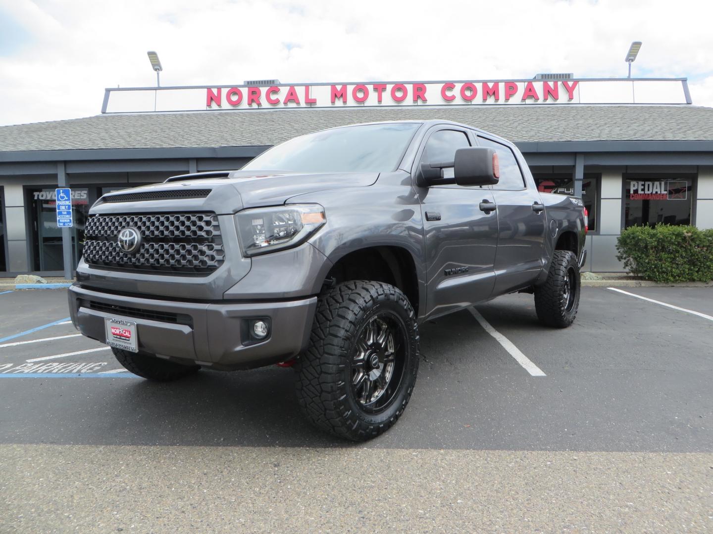 2021 CHARCOAL /GREY Toyota Tundra SR5 (5TFDY5F16MX) with an 5.7L V8 OHV 16V engine, automatic transmission, located at 2630 Grass Valley Highway, Auburn, CA, 95603, (530) 508-5100, 38.937893, -121.095482 - Features a Zone Offroad level kit, 20" SOTA wheels, 35" Nitto Ridge Grappler tires, Fox rear shocks, Air bags, front and rear TRD sway bars, and Window tint. - Photo#0